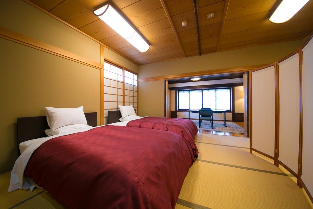 Hotel Ryotei Tanokura à Yufu Extérieur photo